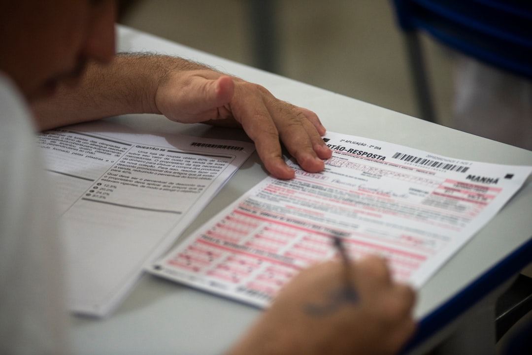 Person filling out an online form - b-1 visitor visa attorney