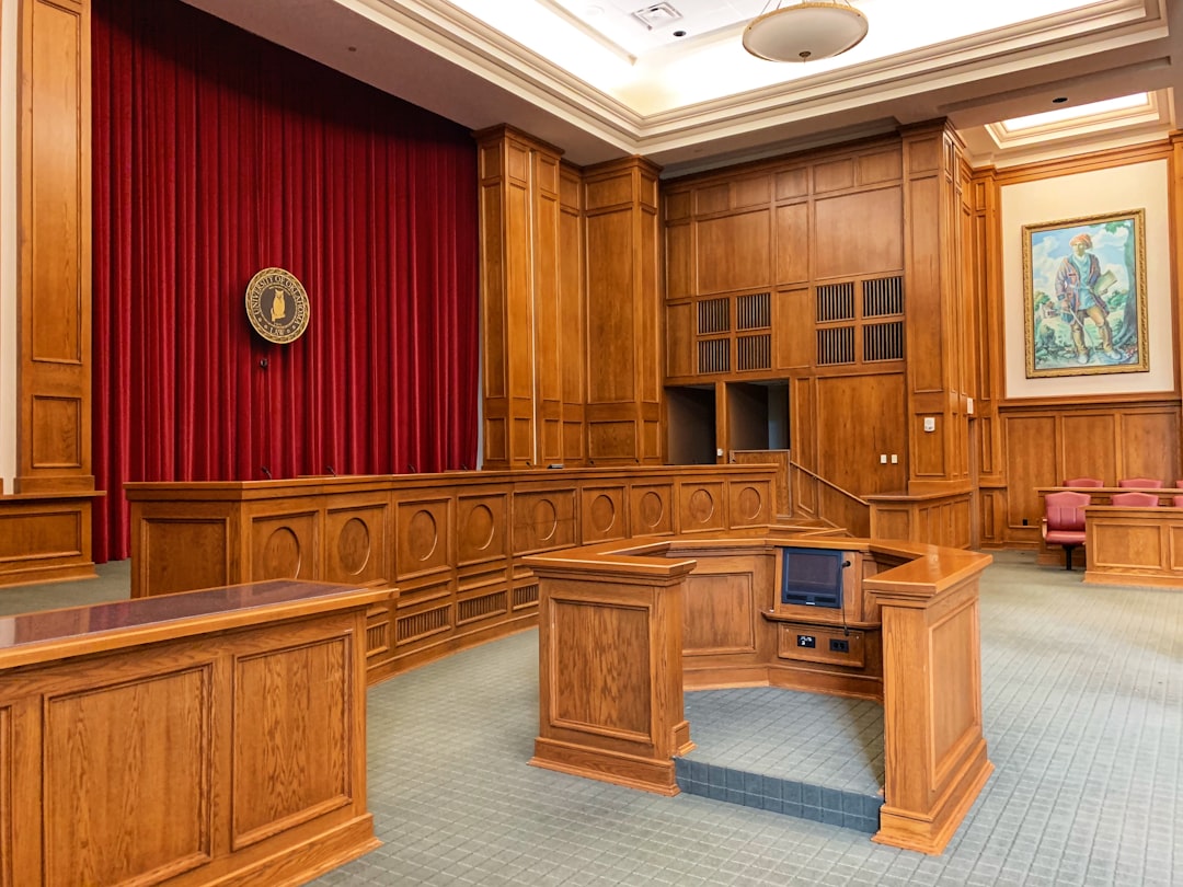 image of an empty, formal hearing room or courtroom - Difficult immigration cases