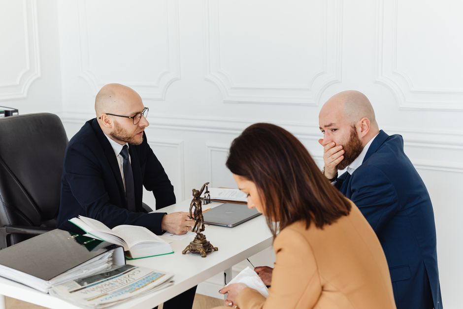 experienced immigration lawyer consulting client - how to stop removal proceedings