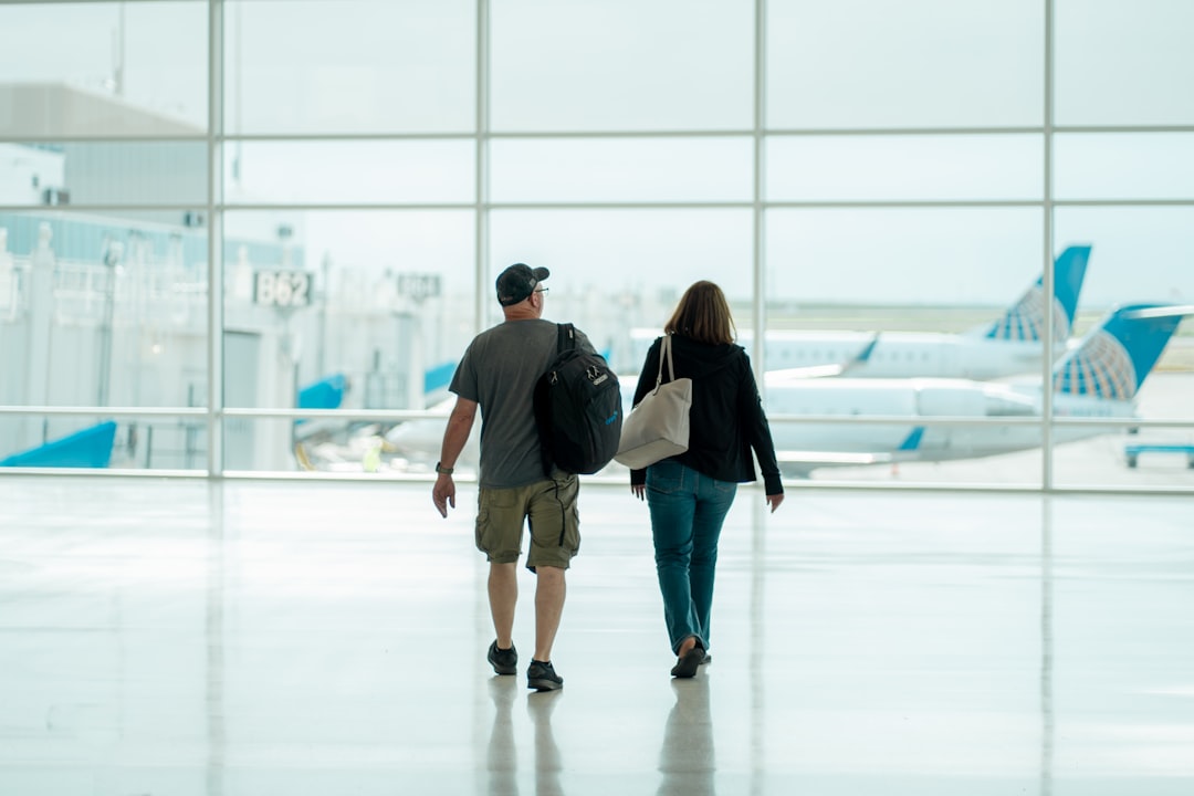 family reuniting at an airport - immigration attorney cost